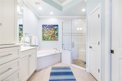 This stunning southern-exposure end unit offers some of the most on West Bay Beach and Golf Club in Florida - for sale on GolfHomes.com, golf home, golf lot