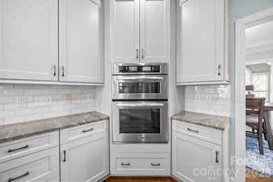 Stunning, custom-built full brick home perfectly positioned with on Fox Den Country Club in North Carolina - for sale on GolfHomes.com, golf home, golf lot