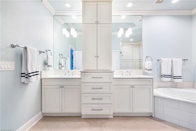 This stunning southern-exposure end unit offers some of the most on West Bay Beach and Golf Club in Florida - for sale on GolfHomes.com, golf home, golf lot