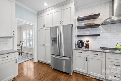 Stunning, custom-built full brick home perfectly positioned with on Fox Den Country Club in North Carolina - for sale on GolfHomes.com, golf home, golf lot