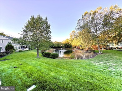 Beautiful pond front coastal home located just 4 miles to the on Bayside Resort Golf Club in Delaware - for sale on GolfHomes.com, golf home, golf lot