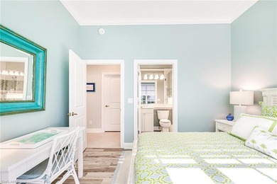 This stunning southern-exposure end unit offers some of the most on West Bay Beach and Golf Club in Florida - for sale on GolfHomes.com, golf home, golf lot