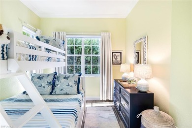 This stunning southern-exposure end unit offers some of the most on West Bay Beach and Golf Club in Florida - for sale on GolfHomes.com, golf home, golf lot