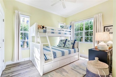 This stunning southern-exposure end unit offers some of the most on West Bay Beach and Golf Club in Florida - for sale on GolfHomes.com, golf home, golf lot