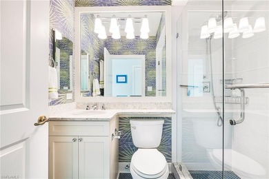 This stunning southern-exposure end unit offers some of the most on West Bay Beach and Golf Club in Florida - for sale on GolfHomes.com, golf home, golf lot