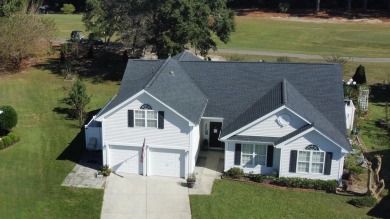 OPEN HOUSE + a recent price adjustmente, see this home in person on Myrtle Beach National Golf Course in South Carolina - for sale on GolfHomes.com, golf home, golf lot