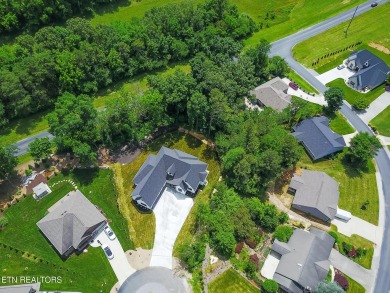 Welcome to 205 Inagehi Trace, a custom-built masterpiece in the on Tellico Village Golf Club in Tennessee - for sale on GolfHomes.com, golf home, golf lot