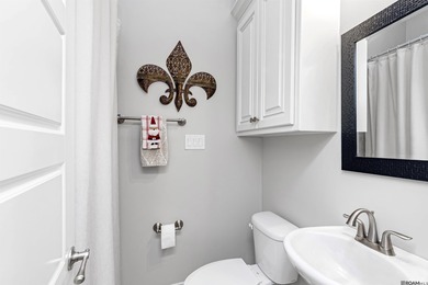 Discover the expert architecture and luxurious, move-in-ready on Pelican Point Golf Club in Louisiana - for sale on GolfHomes.com, golf home, golf lot