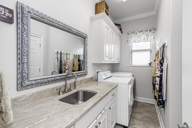 Discover the expert architecture and luxurious, move-in-ready on Pelican Point Golf Club in Louisiana - for sale on GolfHomes.com, golf home, golf lot