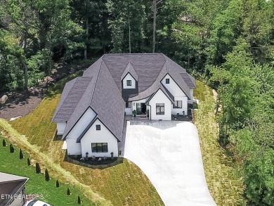 Welcome to 205 Inagehi Trace, a custom-built masterpiece in the on Tellico Village Golf Club in Tennessee - for sale on GolfHomes.com, golf home, golf lot