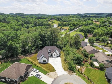Welcome to 205 Inagehi Trace, a custom-built masterpiece in the on Tellico Village Golf Club in Tennessee - for sale on GolfHomes.com, golf home, golf lot