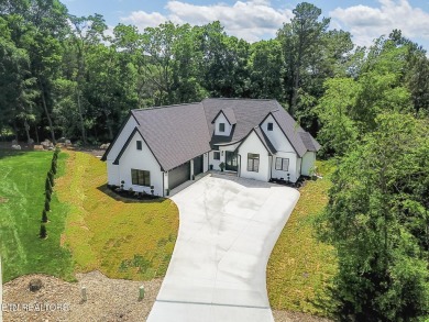 Welcome to 205 Inagehi Trace, a custom-built masterpiece in the on Tellico Village Golf Club in Tennessee - for sale on GolfHomes.com, golf home, golf lot