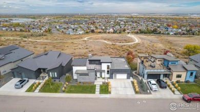 Welcome to this custom-built masterpiece overlooking panoramic on Pelican Lakes Golf and Country Club in Colorado - for sale on GolfHomes.com, golf home, golf lot