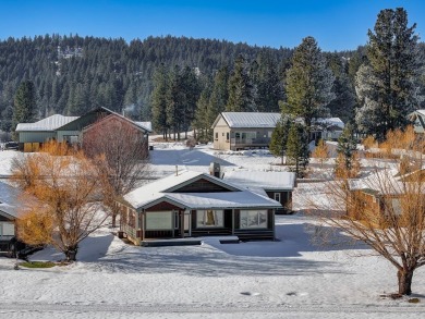 Enjoy the spectacular sweeping views of Meadows Valley and on Meadowcreek Golf Resort in Idaho - for sale on GolfHomes.com, golf home, golf lot