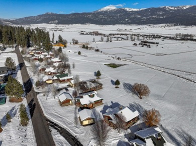 Enjoy the spectacular sweeping views of Meadows Valley and on Meadowcreek Golf Resort in Idaho - for sale on GolfHomes.com, golf home, golf lot