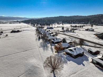 Enjoy the spectacular sweeping views of Meadows Valley and on Meadowcreek Golf Resort in Idaho - for sale on GolfHomes.com, golf home, golf lot