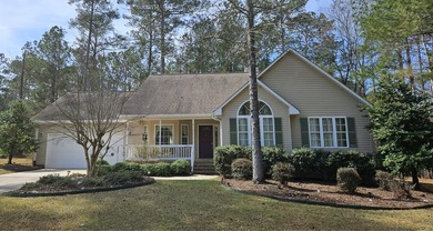 Welcome to 202 Shady Pine Lane, a delightful 3-bedroom, 2-bath on Monticello Golf Club At Savannah Lakes in South Carolina - for sale on GolfHomes.com, golf home, golf lot