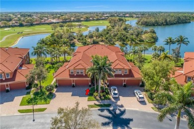 This first floor coach home has a spectacular lake and island on Lely Resort Golf and Country Club in Florida - for sale on GolfHomes.com, golf home, golf lot