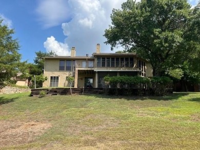 True diamond in the rough!  A fixer upper on Trophy Club CC on Trophy Club of Dallas in Texas - for sale on GolfHomes.com, golf home, golf lot