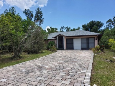 Motivated Seller,   This Beautiful 4 bed, 2 bath, 2-car garage on Port Charlotte Golf Club in Florida - for sale on GolfHomes.com, golf home, golf lot