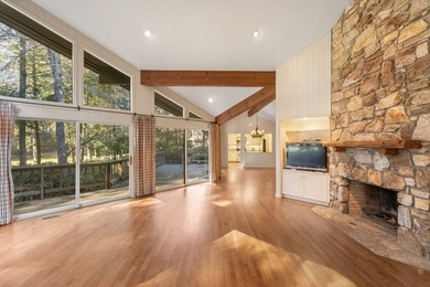 Enjoy the huge decks and flat yard from this well maintained 3- on Highlands Country Club in North Carolina - for sale on GolfHomes.com, golf home, golf lot