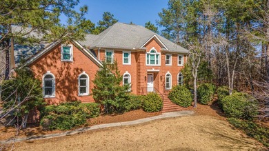 Discover timeless elegance and golf course living in this on Woodside Plantation Country Club in South Carolina - for sale on GolfHomes.com, golf home, golf lot