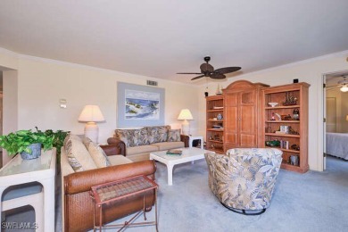 You are just steps to the inviting community pool from this on Fiddlesticks Country Club in Florida - for sale on GolfHomes.com, golf home, golf lot