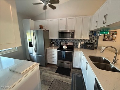 Golfview Golf & Racquet Club Experience breathtaking on  in Florida - for sale on GolfHomes.com, golf home, golf lot