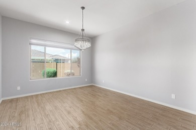 Discover this stunning Serenity model on a corner lot in the on Copper Canyon Golf Club in Arizona - for sale on GolfHomes.com, golf home, golf lot