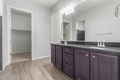 Discover this stunning Serenity model on a corner lot in the on Copper Canyon Golf Club in Arizona - for sale on GolfHomes.com, golf home, golf lot