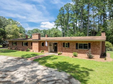 Check out this 3 bedroom 2 bathroom brick home located in on Washington Yacht and Country Club in North Carolina - for sale on GolfHomes.com, golf home, golf lot