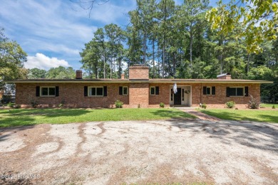 Check out this 3 bedroom 2 bathroom brick home located in on Washington Yacht and Country Club in North Carolina - for sale on GolfHomes.com, golf home, golf lot