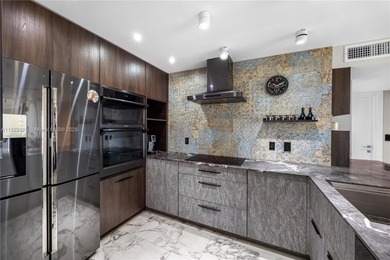 Completely redesigned & fully renovated high-floor 2/2 residence on Turnberry Isle Resort and Club in Florida - for sale on GolfHomes.com, golf home, golf lot