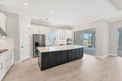 One or more photo(s) has been virtually staged on Esplanade Golf and Country at Lakewood Ranch in Florida - for sale on GolfHomes.com, golf home, golf lot