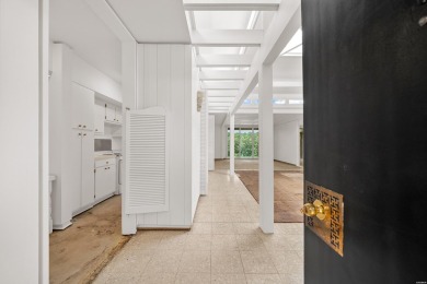 The stunning timeless architecture of these condominiums on Belvedere Golf Club in Arkansas - for sale on GolfHomes.com, golf home, golf lot