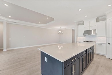 One or more photo(s) has been virtually staged on Esplanade Golf and Country at Lakewood Ranch in Florida - for sale on GolfHomes.com, golf home, golf lot