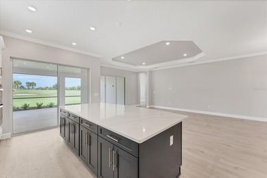 One or more photo(s) has been virtually staged on Esplanade Golf and Country at Lakewood Ranch in Florida - for sale on GolfHomes.com, golf home, golf lot