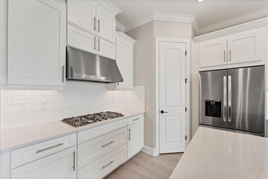 One or more photo(s) has been virtually staged on Esplanade Golf and Country at Lakewood Ranch in Florida - for sale on GolfHomes.com, golf home, golf lot