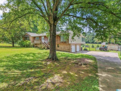 Nestled on a spacious lot alongside the golf course, this home on Cumberland Lake Country Club in Alabama - for sale on GolfHomes.com, golf home, golf lot