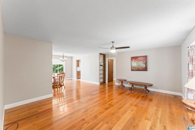 Nestled on a spacious lot alongside the golf course, this home on Cumberland Lake Country Club in Alabama - for sale on GolfHomes.com, golf home, golf lot