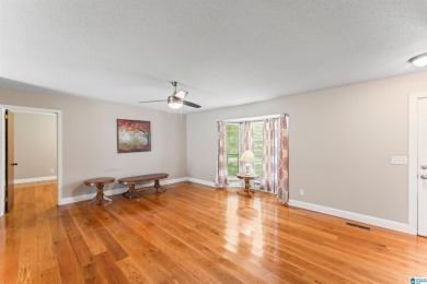 Nestled on a spacious lot alongside the golf course, this home on Cumberland Lake Country Club in Alabama - for sale on GolfHomes.com, golf home, golf lot