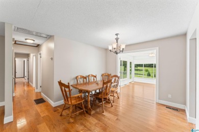 Nestled on a spacious lot alongside the golf course, this home on Cumberland Lake Country Club in Alabama - for sale on GolfHomes.com, golf home, golf lot