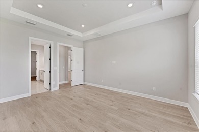 One or more photo(s) has been virtually staged on Esplanade Golf and Country at Lakewood Ranch in Florida - for sale on GolfHomes.com, golf home, golf lot