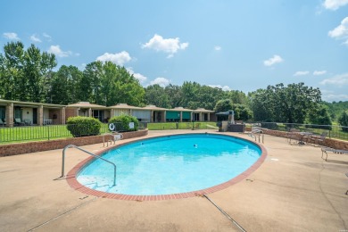 The stunning timeless architecture of these condominiums on Belvedere Golf Club in Arkansas - for sale on GolfHomes.com, golf home, golf lot
