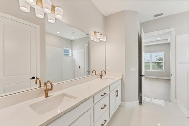 One or more photo(s) has been virtually staged on Esplanade Golf and Country at Lakewood Ranch in Florida - for sale on GolfHomes.com, golf home, golf lot