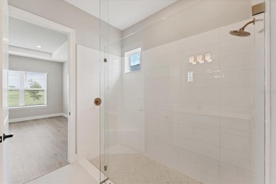 One or more photo(s) has been virtually staged on Esplanade Golf and Country at Lakewood Ranch in Florida - for sale on GolfHomes.com, golf home, golf lot