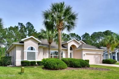 Look no further than this Tiffany model that backs up to a on Plantation Bay Golf and Country Club in Florida - for sale on GolfHomes.com, golf home, golf lot