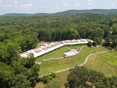 The stunning timeless architecture of these condominiums on Belvedere Golf Club in Arkansas - for sale on GolfHomes.com, golf home, golf lot