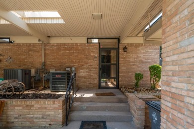 The stunning timeless architecture of these condominiums on Belvedere Golf Club in Arkansas - for sale on GolfHomes.com, golf home, golf lot