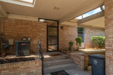 The stunning timeless architecture of these condominiums on Belvedere Golf Club in Arkansas - for sale on GolfHomes.com, golf home, golf lot